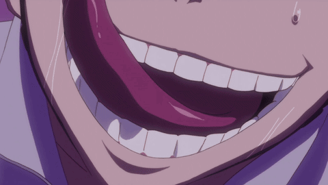 a close up of a person 's mouth with their tongue hanging out
