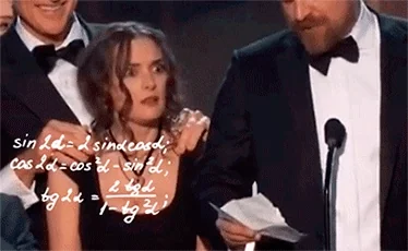 A woman at an awards podium looks around in confused disbelief.