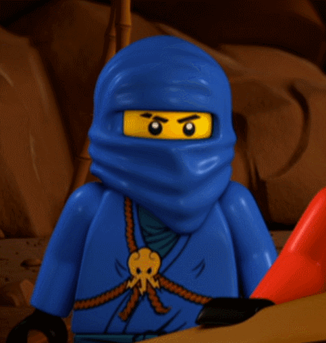 a lego ninja with a blue outfit and a yellow face