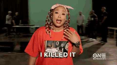 a woman in a red t-shirt says i killed it