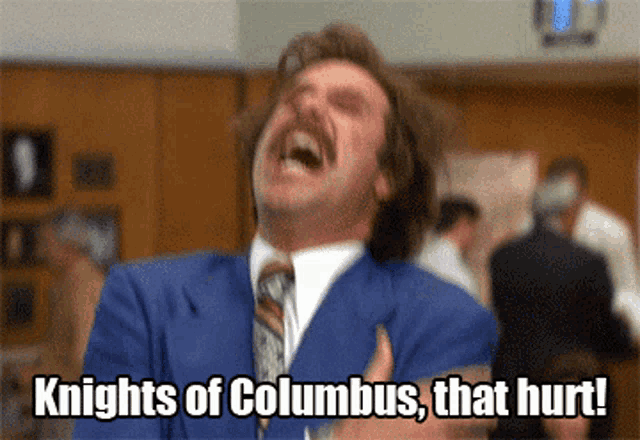 A man in a blue suit throws his head back in pain as text says “Knights of Columbus, that hurt!”