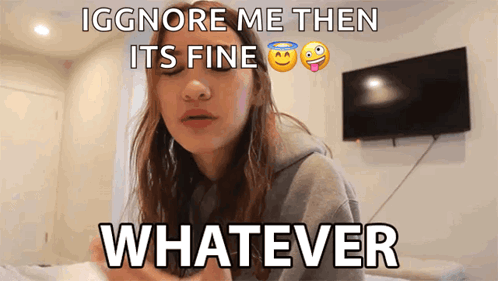 Young woman mouths “WHATEVER” with an annoyed caption above.