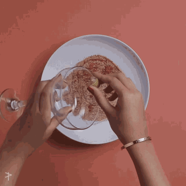 chilli powder and salt are being poured into a bowl