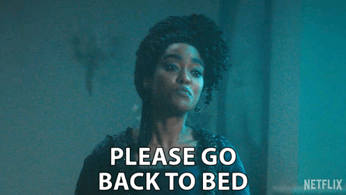 a woman is saying please go back to bed in a dark room