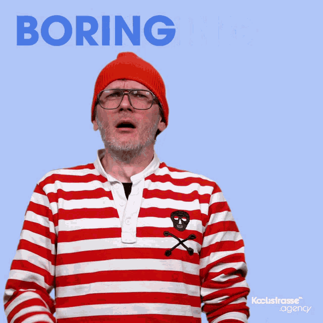 a man wearing a red and white striped shirt with the word boring on the top
