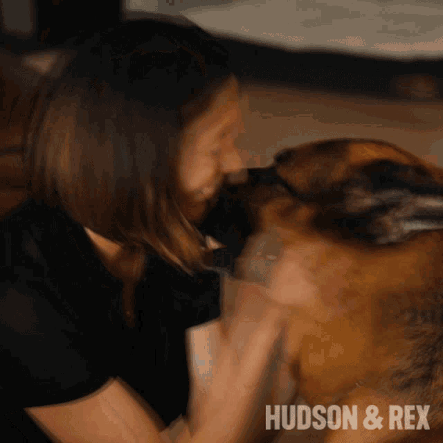 a picture of a woman petting a dog with the words hudson & rex