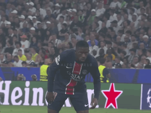 a soccer player with the number 23 on their shorts