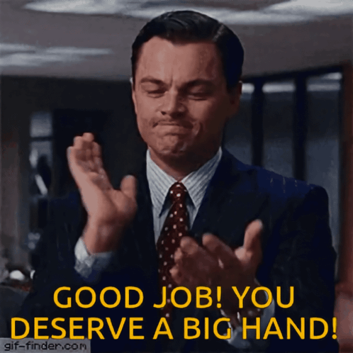 Leonardo DiCaprio claps as yellow text reads “GOOD JOB! YOU DESERVE A BIG HAND!”