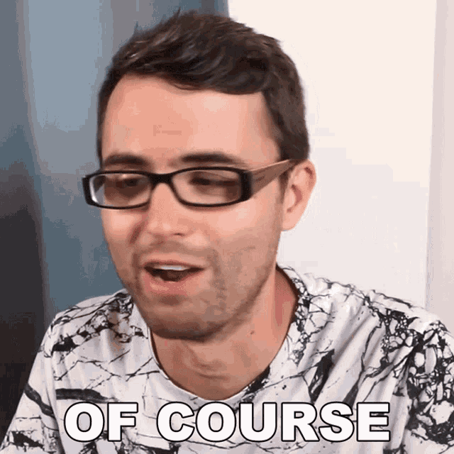 a man wearing glasses and a shirt that says " of course " on it