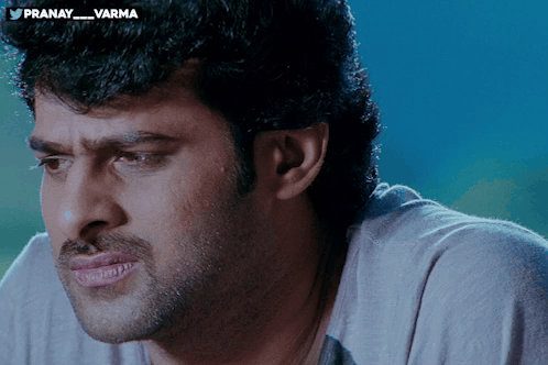 a close up of a man 's face with the hashtag pranay_varma on the bottom