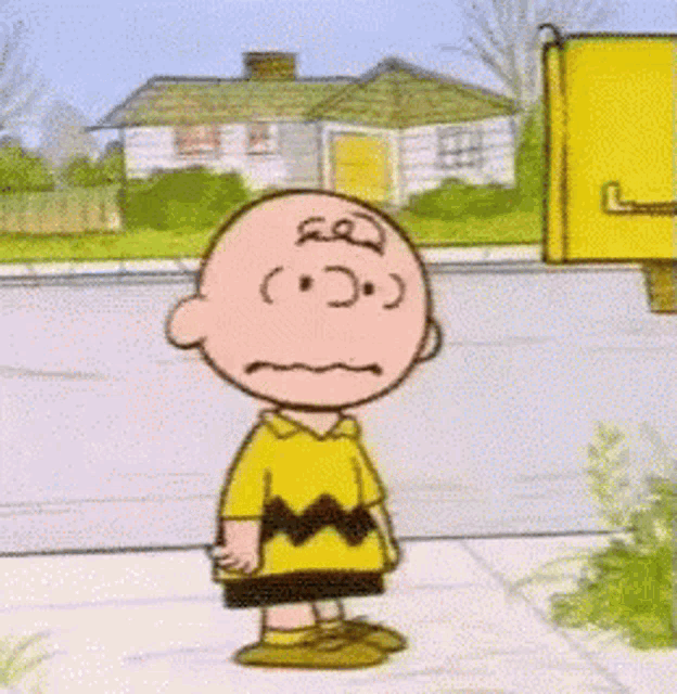 Charlie Brown stands with a frown in a suburban cartoon scene.