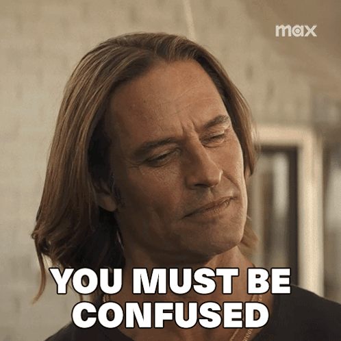 a man with long hair says " you must be confused " in front of a max logo