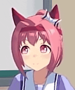 a girl with pink hair and cat ears is wearing a blue shirt .