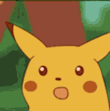 a close up of a pikachu with a surprised look on its face .