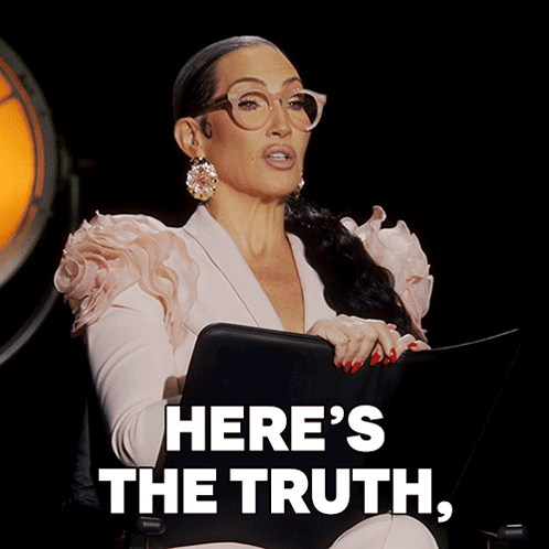 Michelle Visage holds a black cat while text says “HERE'S THE TRUTH, I'M BORED.”