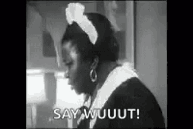 A black-and-white person reacts with a dramatic shocked face.