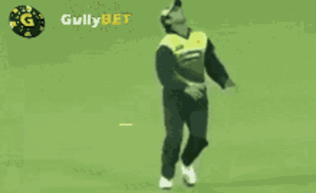 two cricket players on a field with the word gullybet on the bottom
