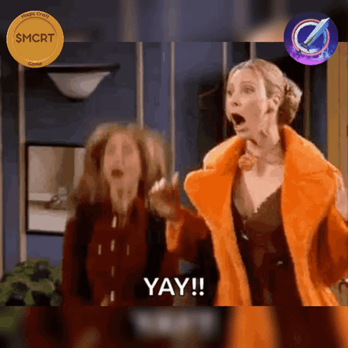 Two women dance excitedly indoors with “YAY!!” onscreen.