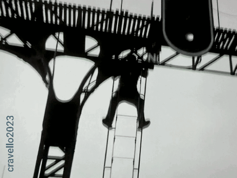 a black and white photo of a bridge with the name cravelli1023 on the bottom
