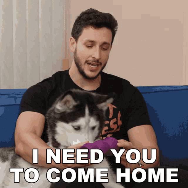 a man sitting on a couch with a husky dog and the words " i need you to come home "