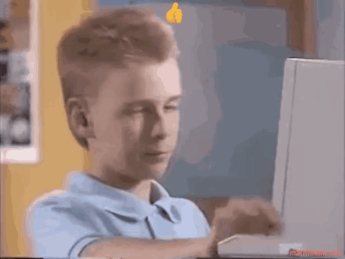 A young person at a computer gives a thumbs up with “OK” text.
