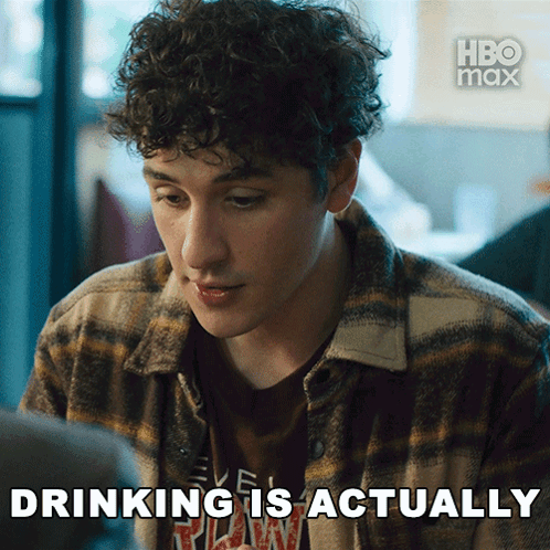 a man in a plaid shirt with the words drinking is actually on the bottom