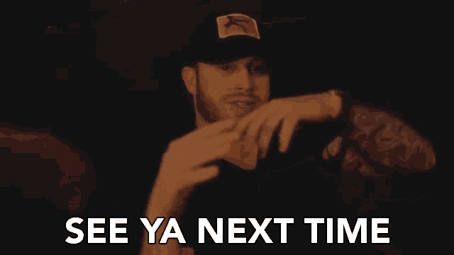 a man in a hat is making a peace sign with his hands and the words `` see ya next time '' .