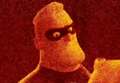 a close up of a person 's face with a red background .