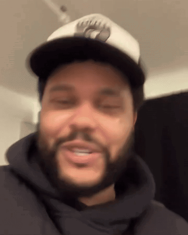 a man with a beard wearing a hat that says ' chicago ' on it