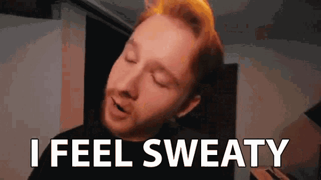 a man is making a funny face and saying `` i feel sweaty '' with his eyes closed .