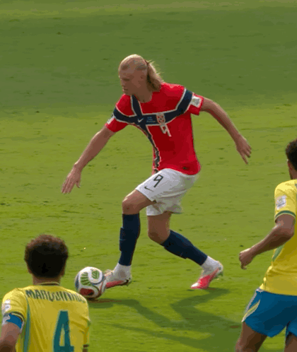 a soccer player in a red jersey with the number 11 on it