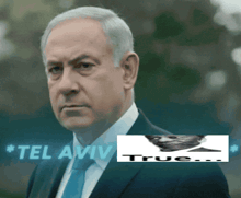 a man in a suit and tie with tel aviv in the corner