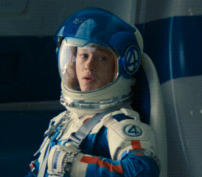 a man wearing a space suit with the number 4 on the sleeve