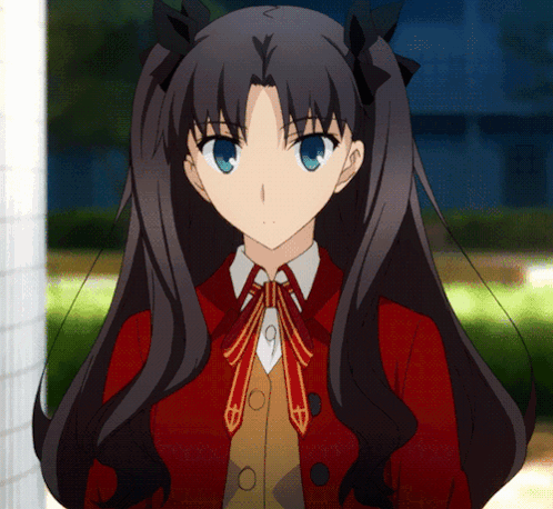 Rin Tohsaka stares ahead with a serious, weary expression.