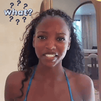 a woman in a blue bikini is smiling with a question mark above her head that says " what "