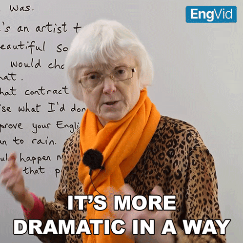 an older woman stands in front of a whiteboard with the words it 's more dramatic in a way
