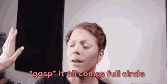 a man is giving a high five to a woman and says `` gasp '' it all comes full circle .