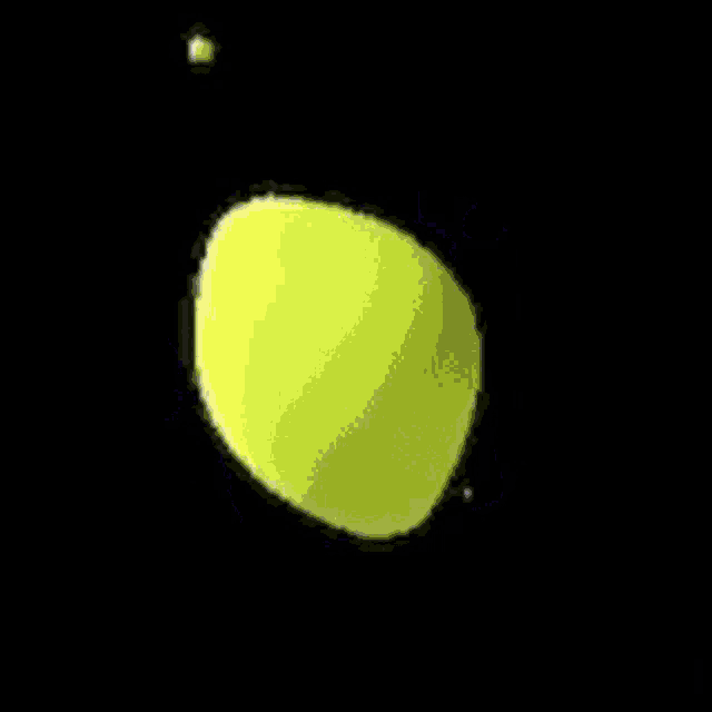 a yellow and black circle with a black circle in the middle