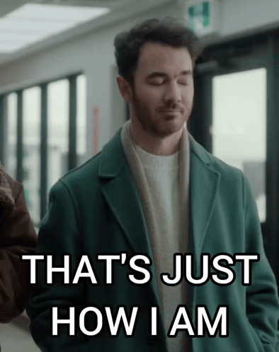 a man in a green coat says " that 's just how i am " with his eyes closed