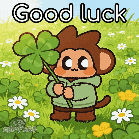 A cartoon monkey holds a four-leaf clover beside large “Good Luck” lettering.