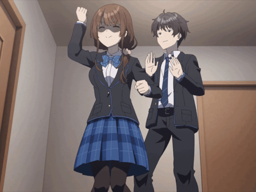 a boy and a girl are standing next to each other