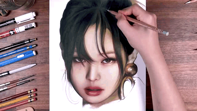 a person is drawing a picture of a woman 's face with a pencil that says ' schneider ' on it