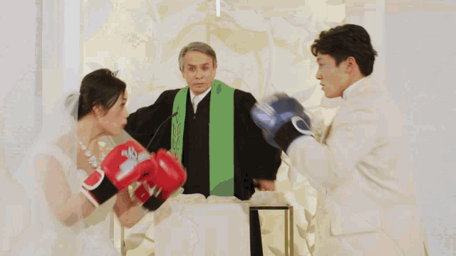 a bride and groom wearing boxing gloves are getting married in a church