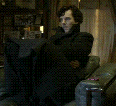 a man is sitting in a chair with his mouth open and the words " noooooo " written above him