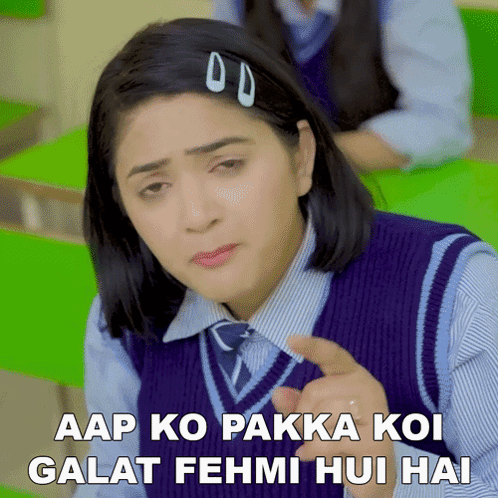 a girl in a classroom with the words " aap ko pakka koi galat fehmi hui hai "