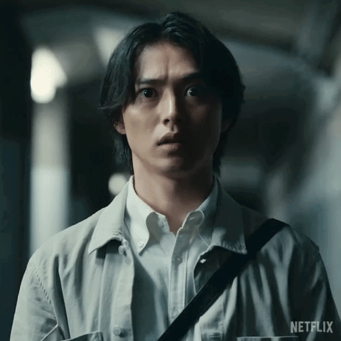a man with a netflix logo on his sleeve