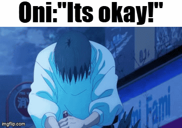 a man is kneeling down in front of a sign that says oni 's okay