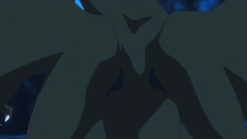 a close up of a dragon 's face with blue flames coming out of it 's mouth