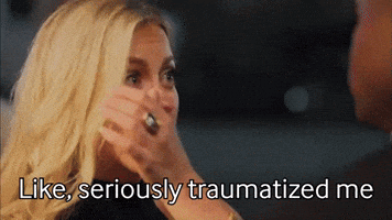 a woman covering her face with her hand and the words like seriously traumatized me below her