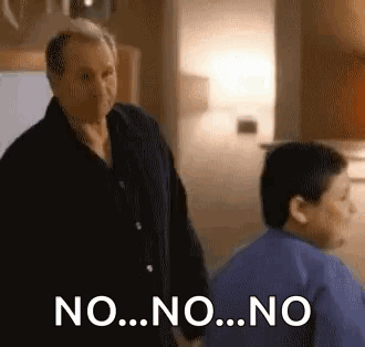 A man stands indoors with the caption “NO...NO...NO.”